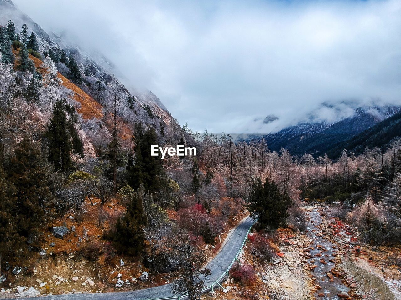 Scenic view of mountains against sky during winter