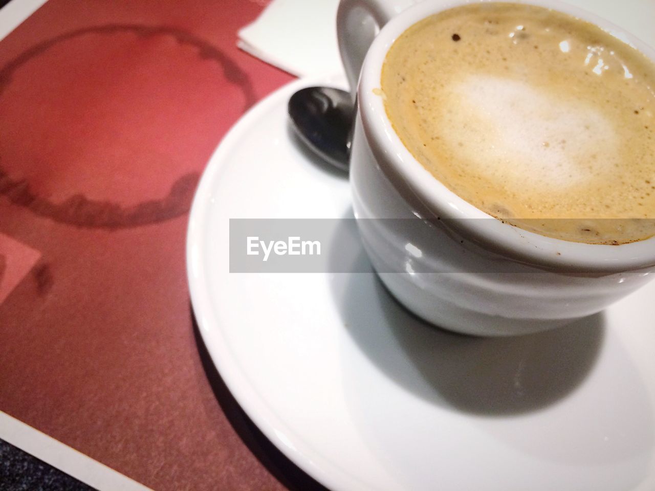 CLOSE-UP OF COFFEE ON TABLE