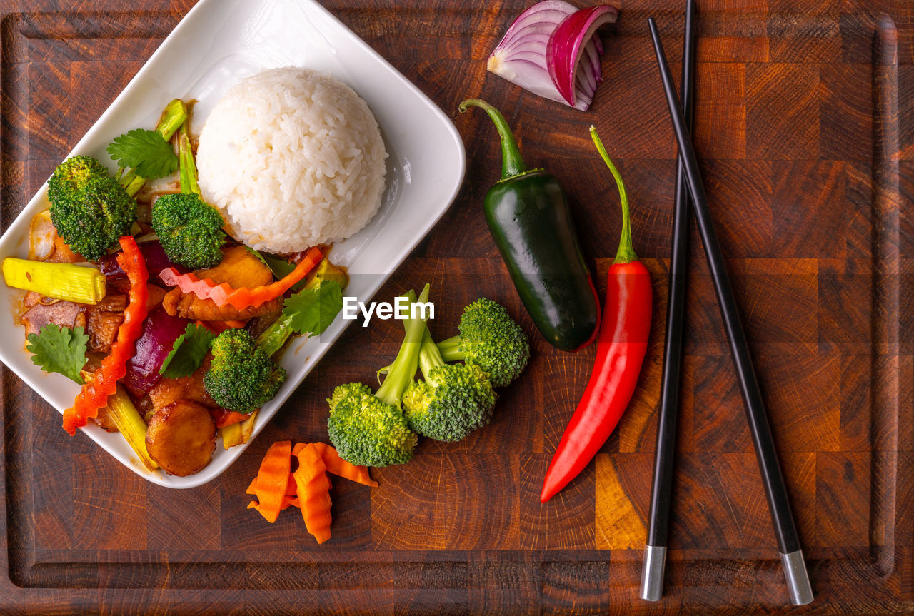 Kung pau chicken or thai chicken wok with rise