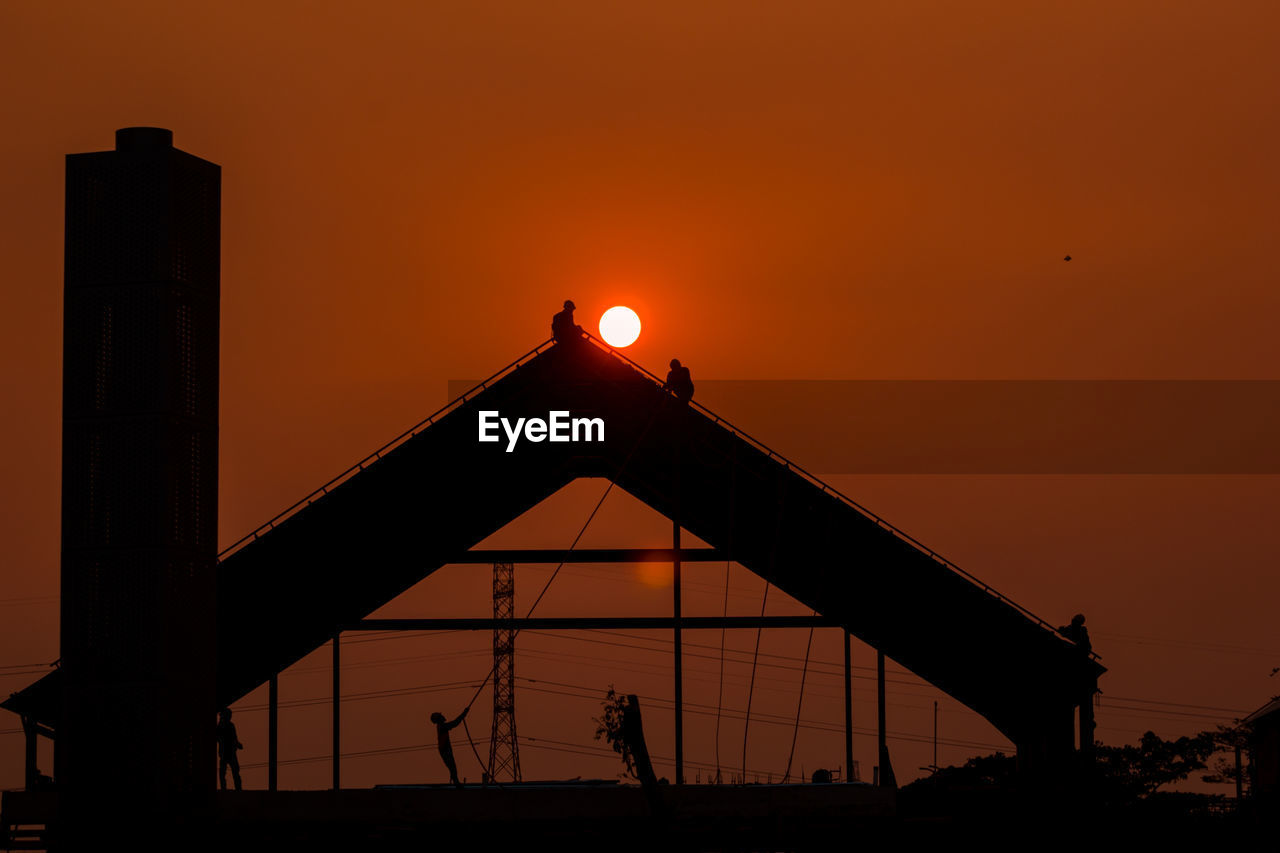 sunset, silhouette, architecture, sky, dusk, evening, built structure, afterglow, orange color, nature, industry, horizon, building exterior, sun, no people, outdoors, light, transportation