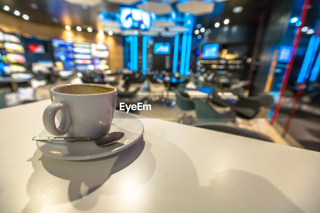 Close-up of coffee cup on table