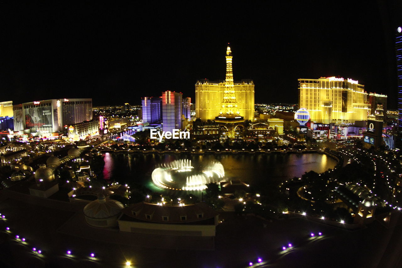 VIEW OF ILLUMINATED CITYSCAPE