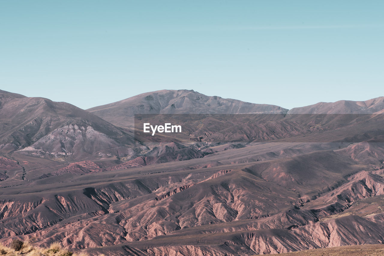 Scenic view of mountains against clear sky