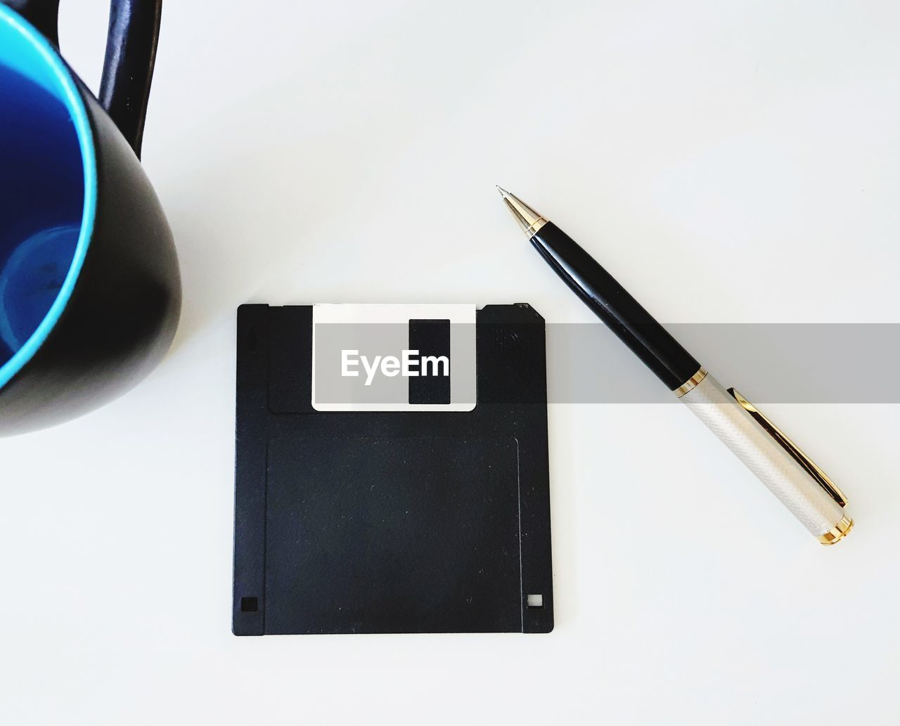 High angle view of pen and diary on table