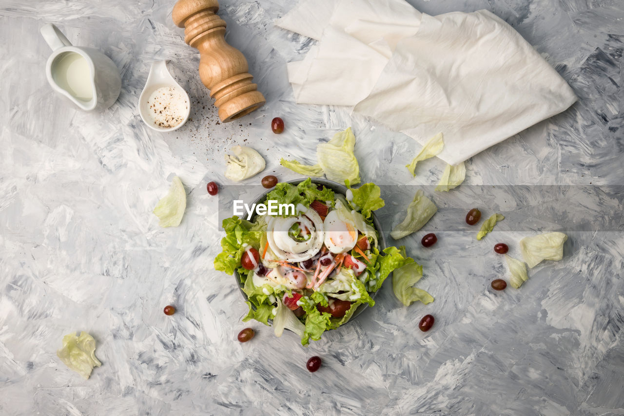 Directly above shot of salad in plate over table