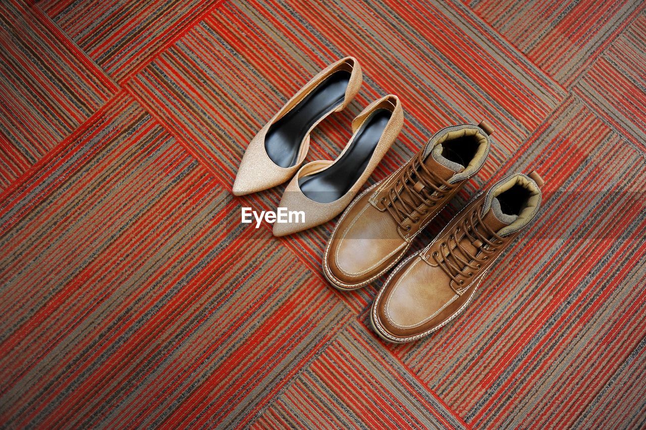 High angle view of shoes on carpet