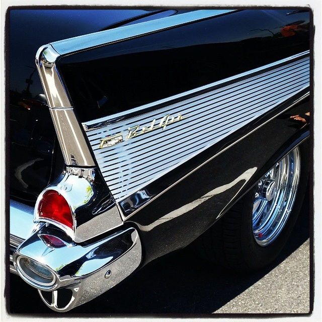 VINTAGE CAR PARKED ON ROAD