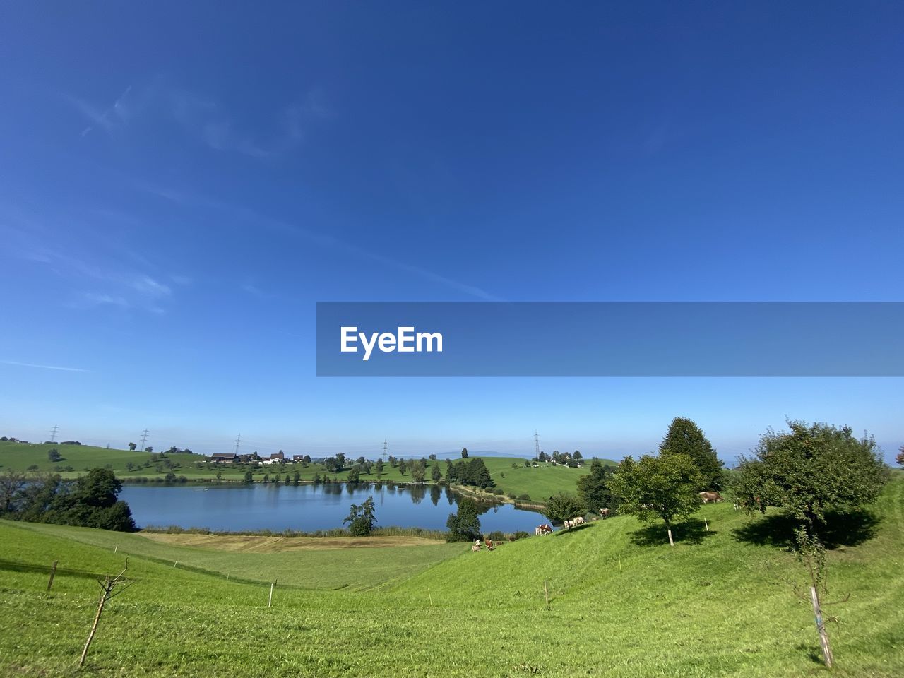 SCENIC VIEW OF LANDSCAPE AGAINST BLUE SKY