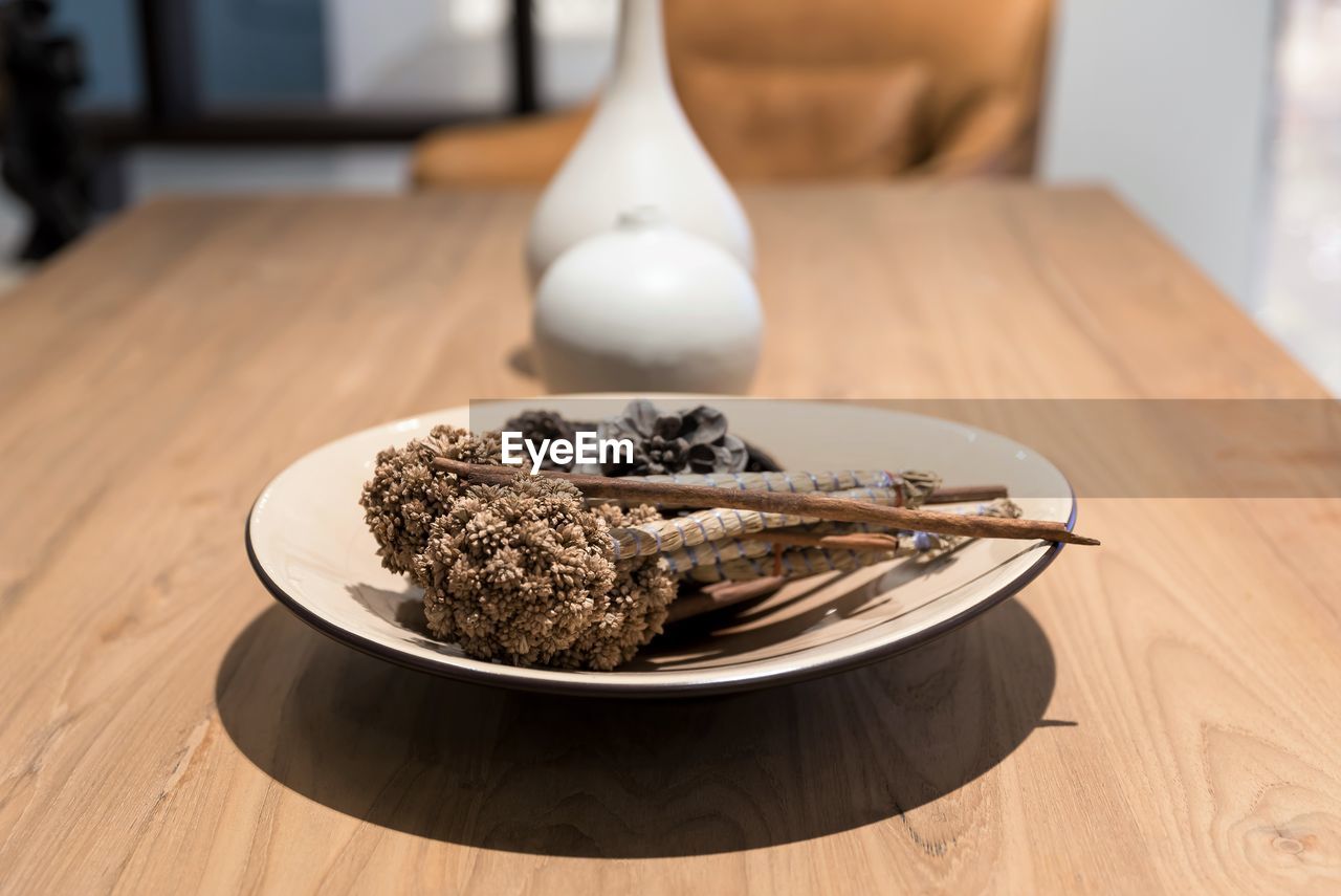 High angle still life view of food in plate on table