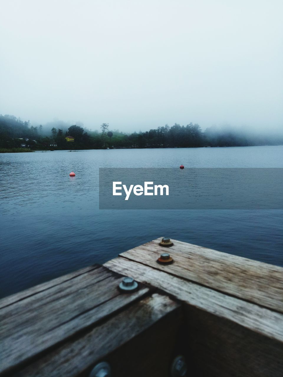 SCENIC VIEW OF PIER OVER LAKE AGAINST SKY