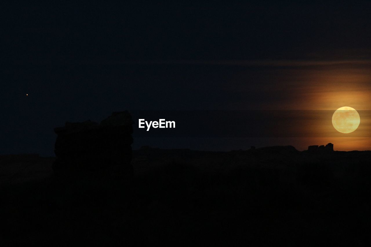 VIEW OF MOON AT NIGHT