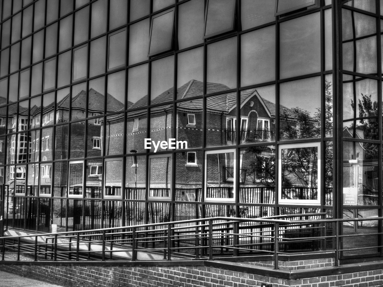 Reflection of buildings on glass