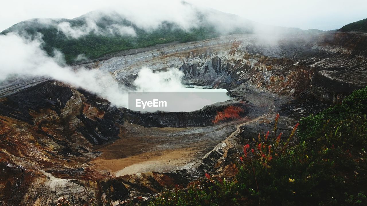 High angle view of smoke on volcanic landscape