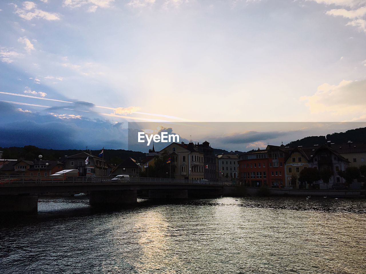 RIVER WITH TOWN IN BACKGROUND