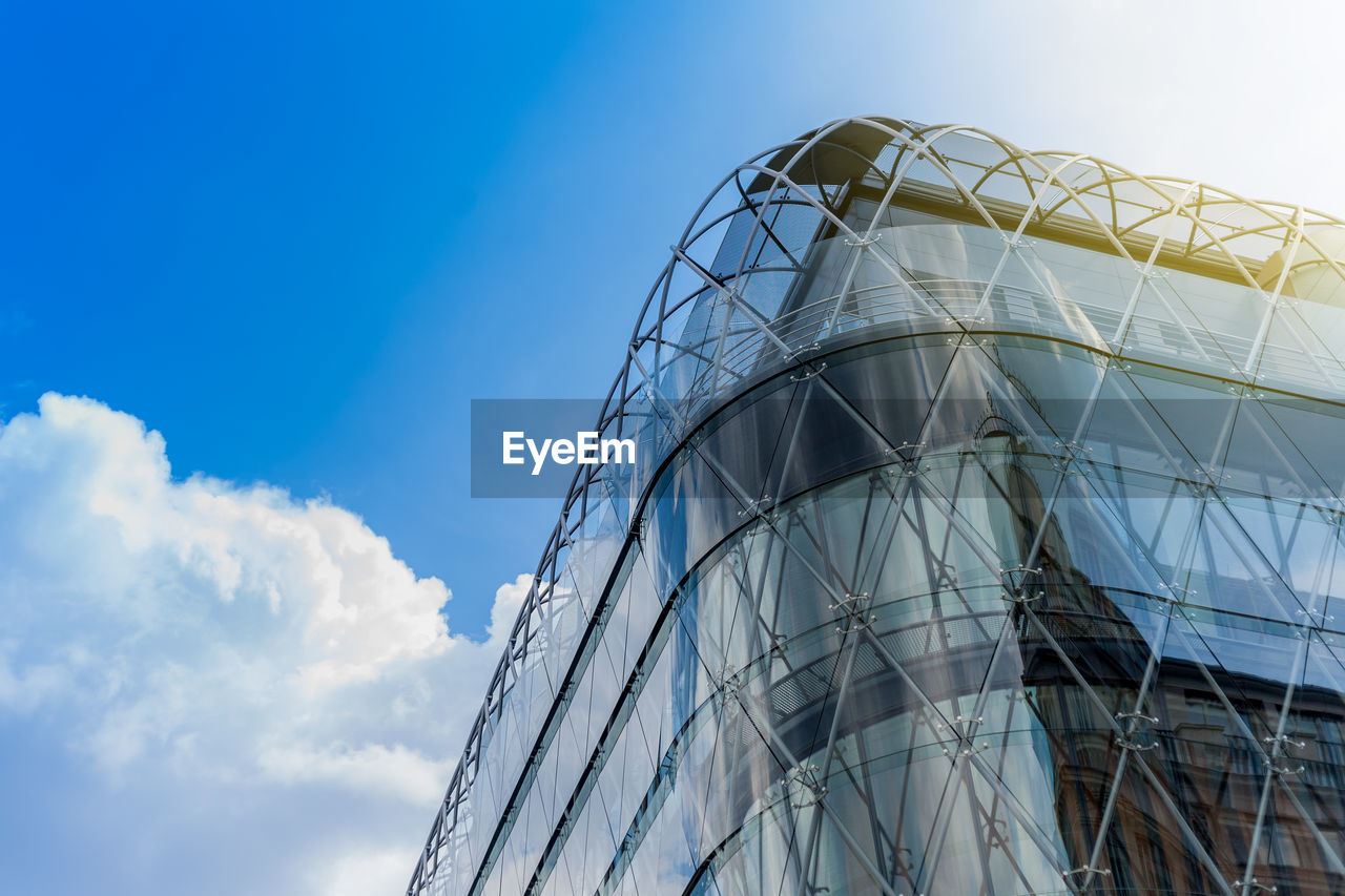 Low angle view of building against blue sky