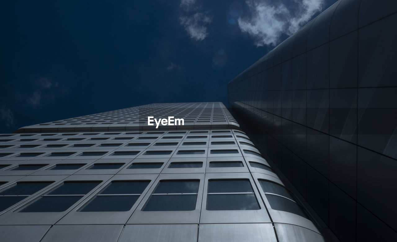 Low angle view of modern building against sky