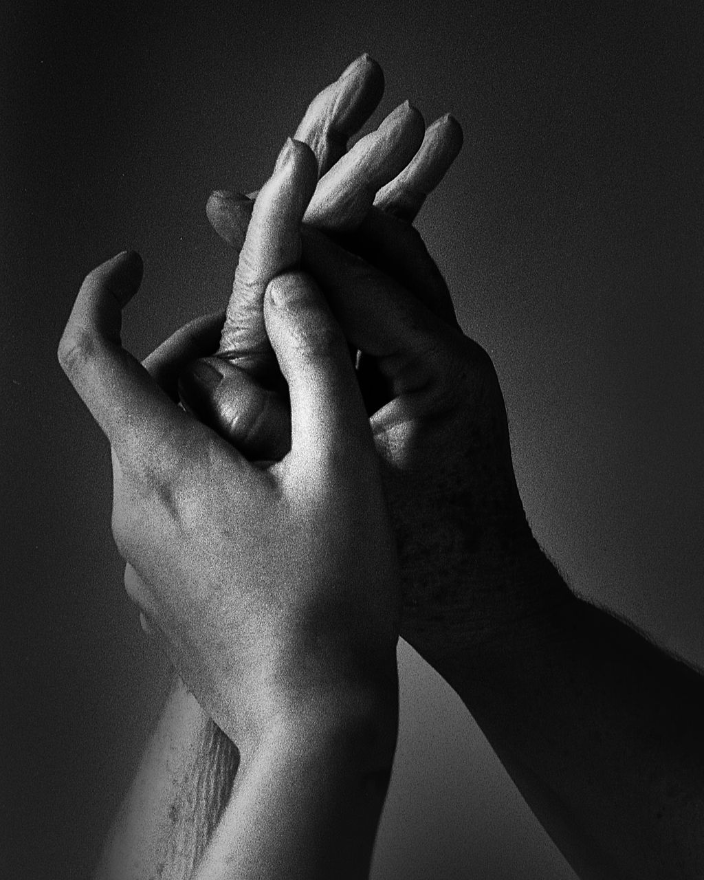 Close-up of human hand against gray background