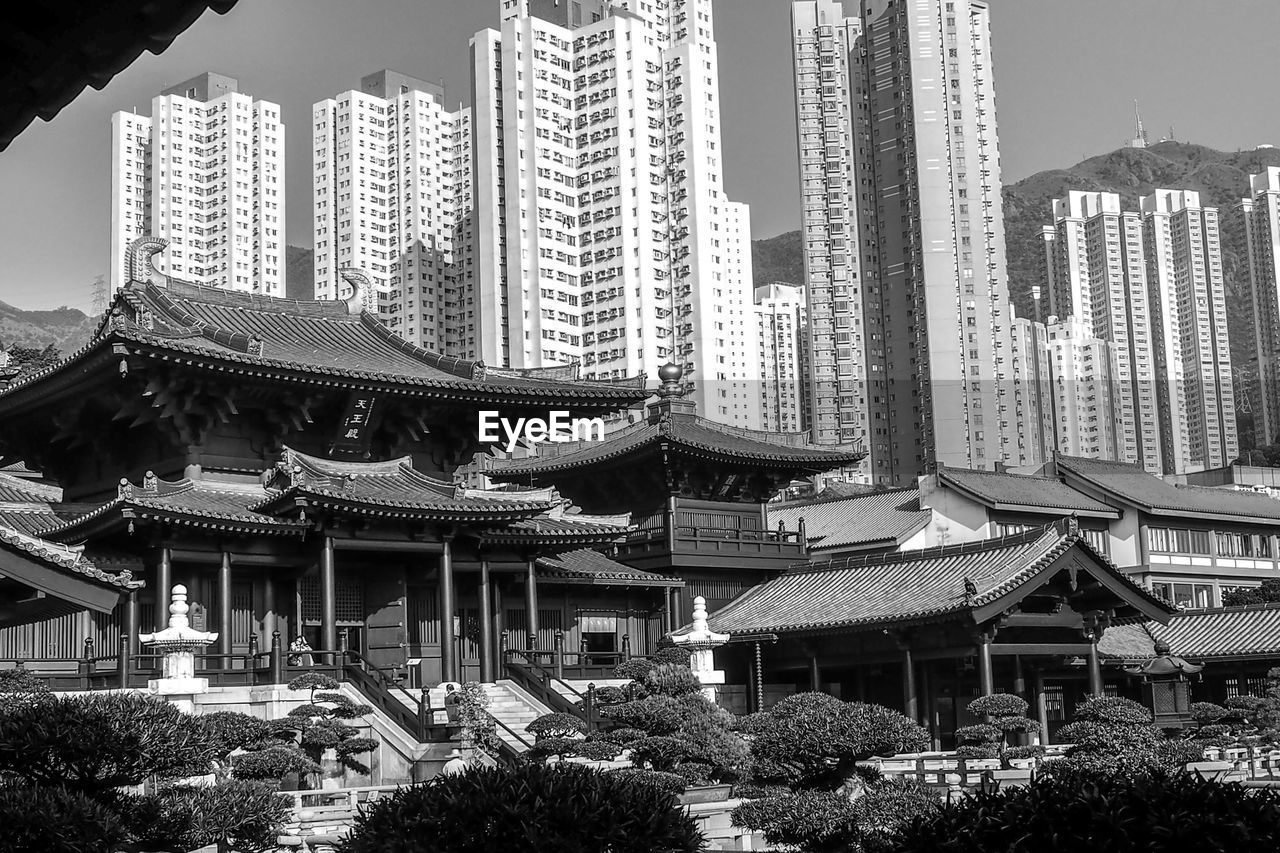 PANORAMIC VIEW OF MODERN BUILDINGS AGAINST SKY