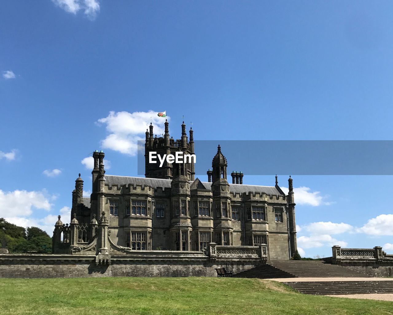 Low angle view of historic building against blue sky