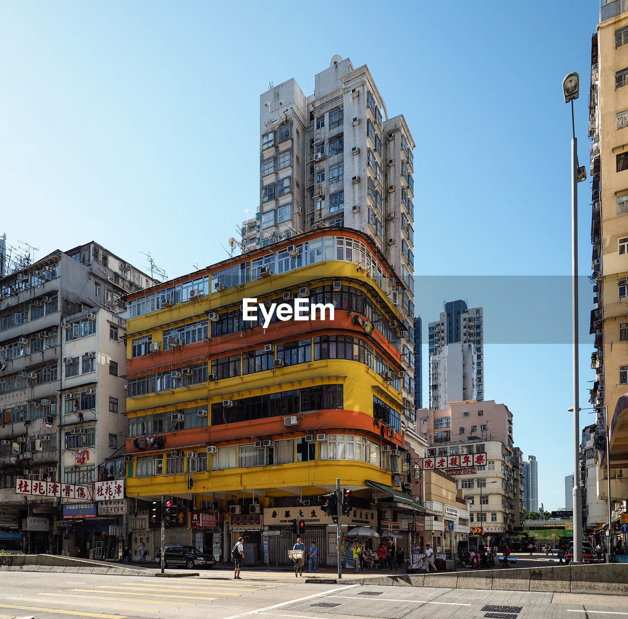 View of buildings in city against clear sky