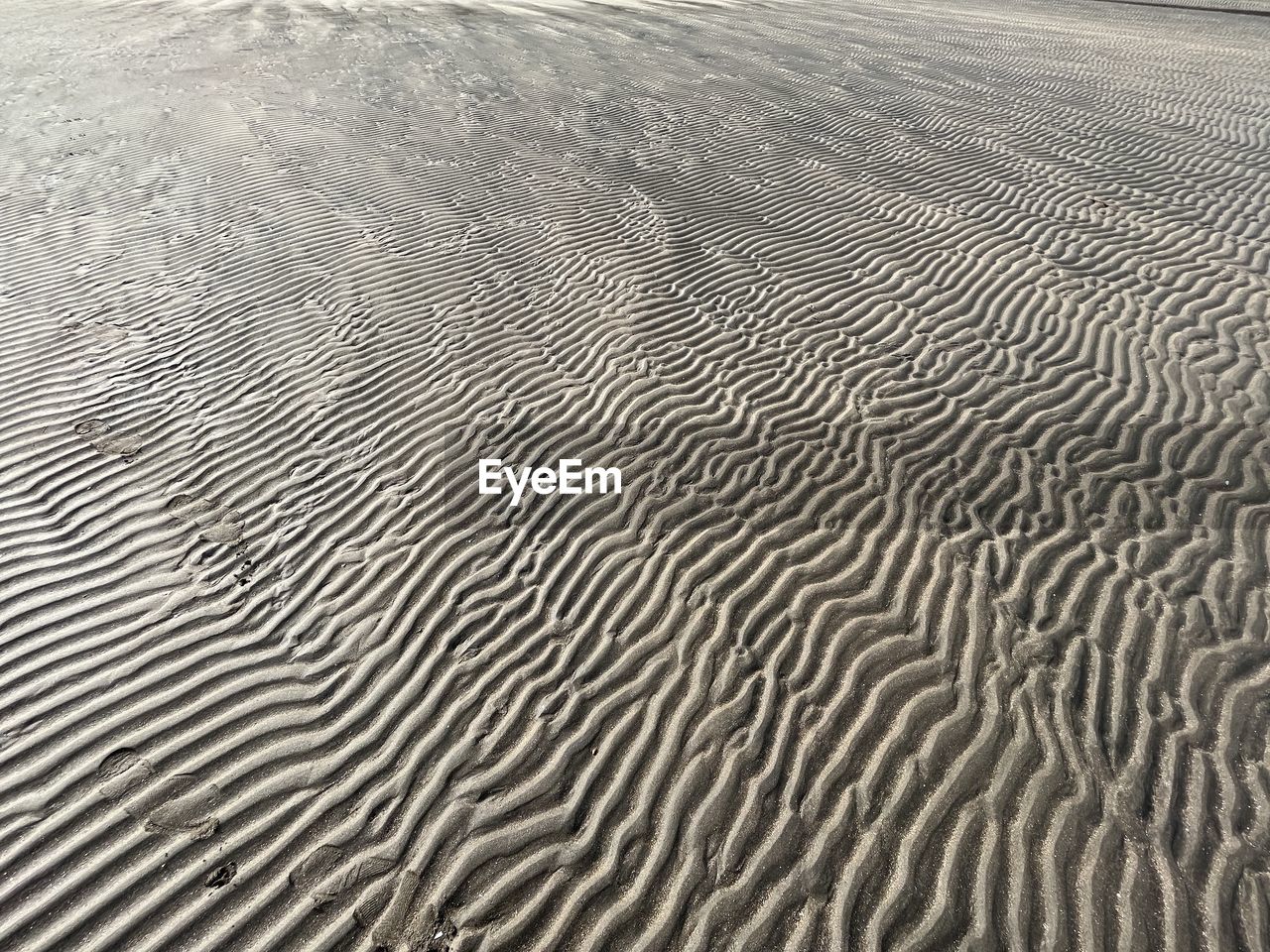 pattern, full frame, no people, backgrounds, textured, nature, line, close-up, sand, wave, water, beauty in nature, day, outdoors, land