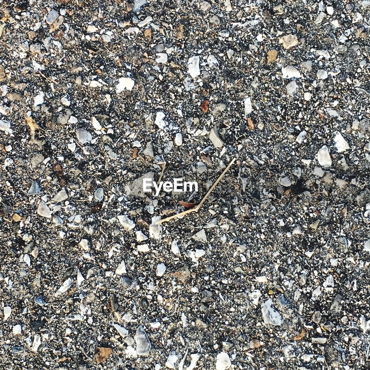 FULL FRAME SHOT OF STONES ON GROUND