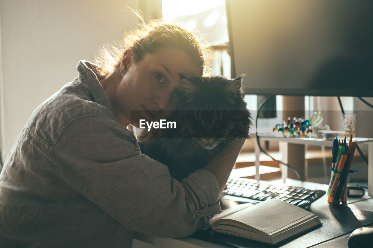 Young woman using laptop at home