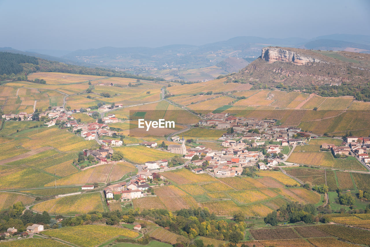 Scenic view of vineyards during autumn. solutré during autumn. beaujolais vines. 