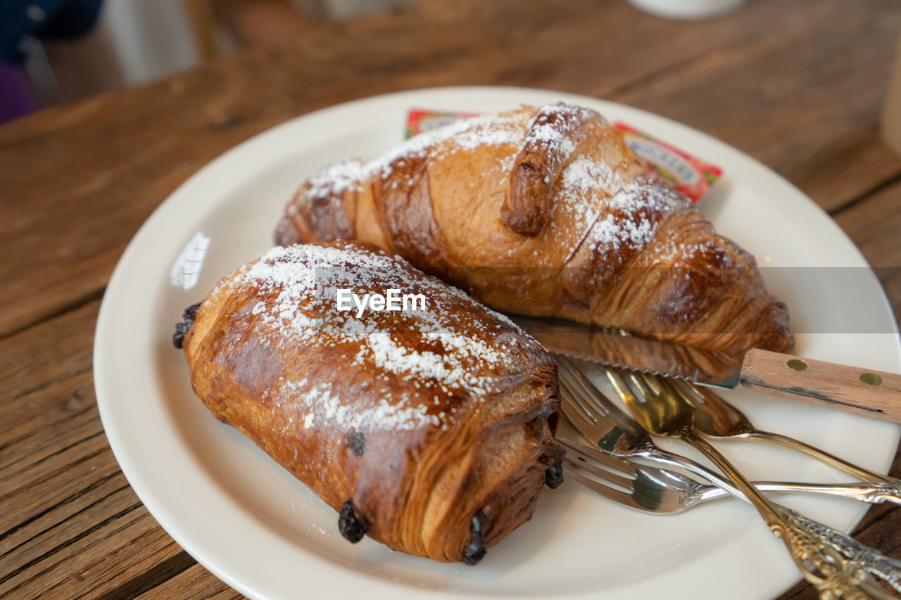 Close-up of breads served on table