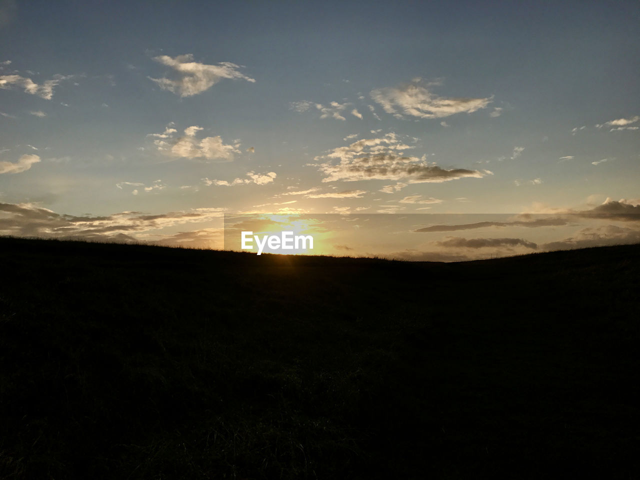 SILHOUETTE LANDSCAPE AGAINST SKY AT SUNSET