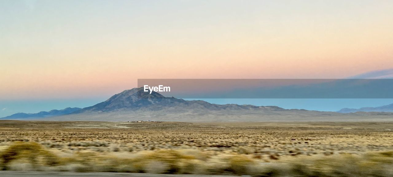 Scenic view of desert against sky