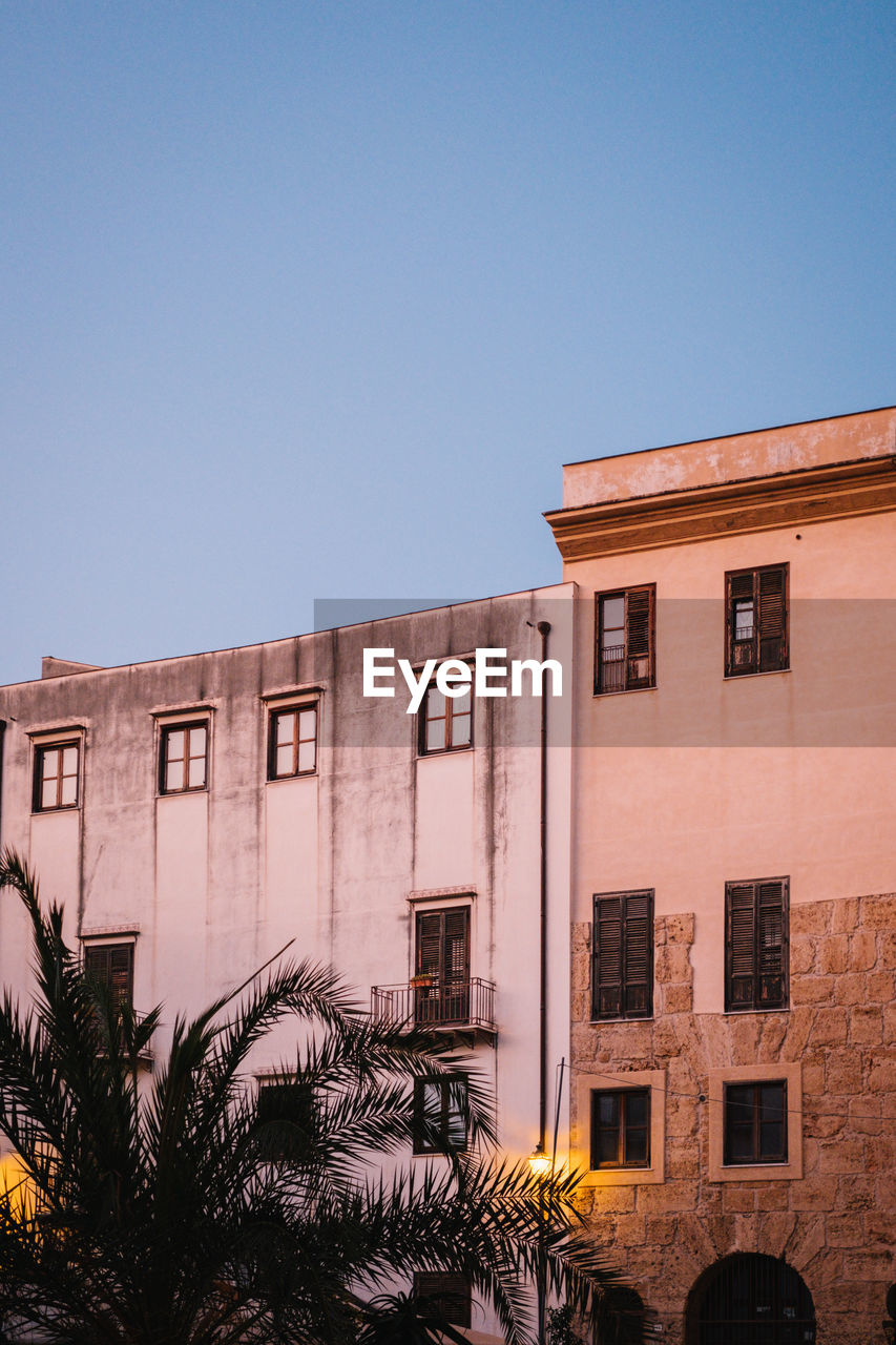 Low angle view of building against clear sky