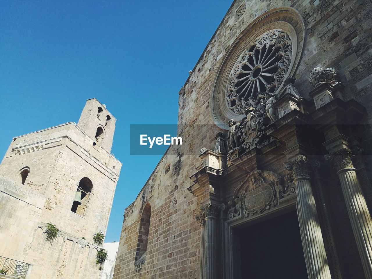 HIGH SECTION OF CHURCH AGAINST CLEAR BLUE SKY