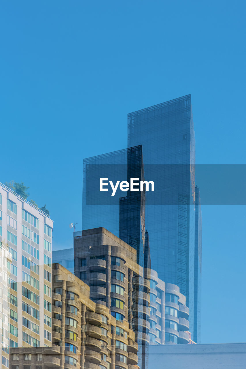 Modern buildings against blue sky