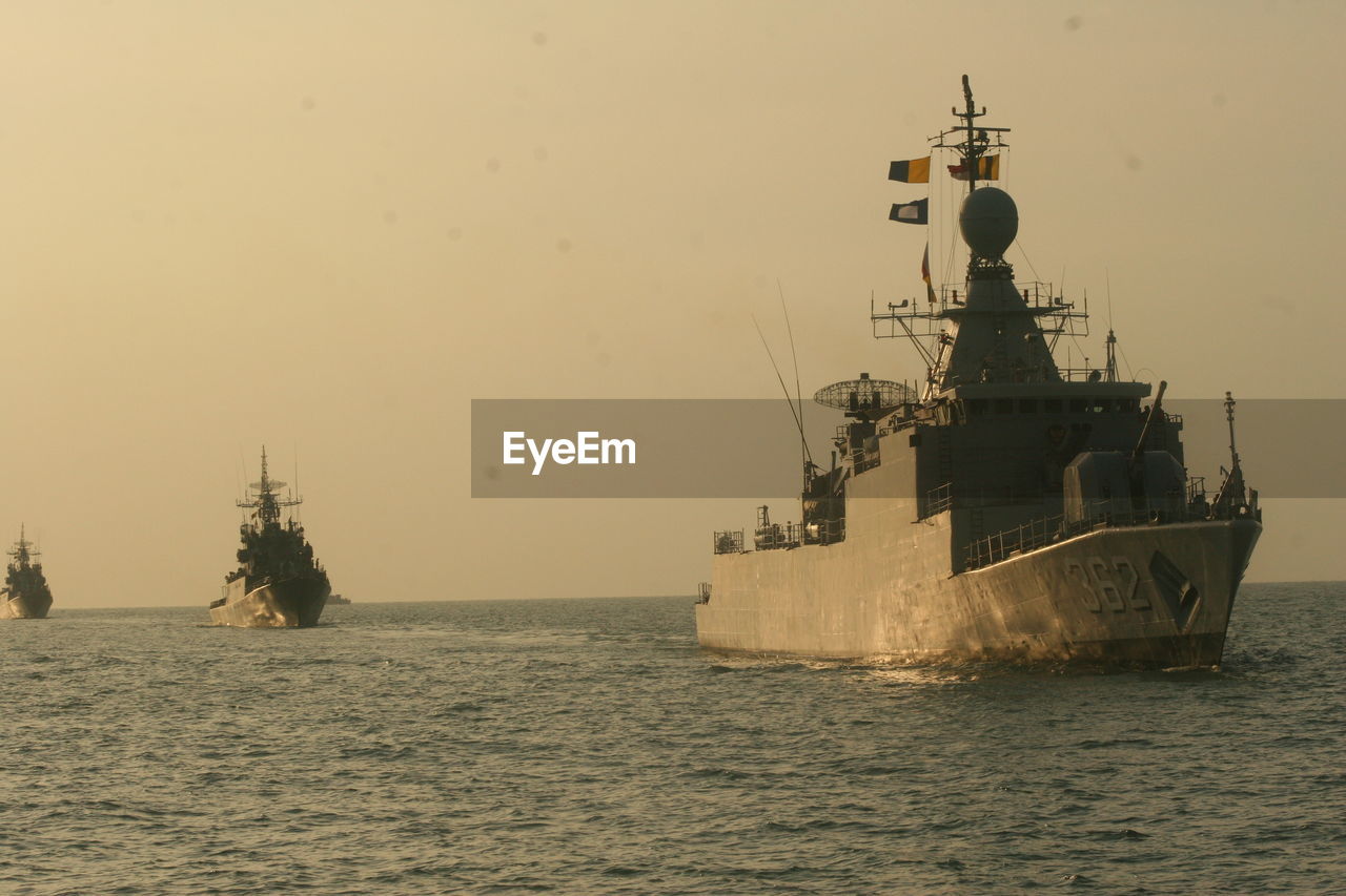 Navy boats in calm sea