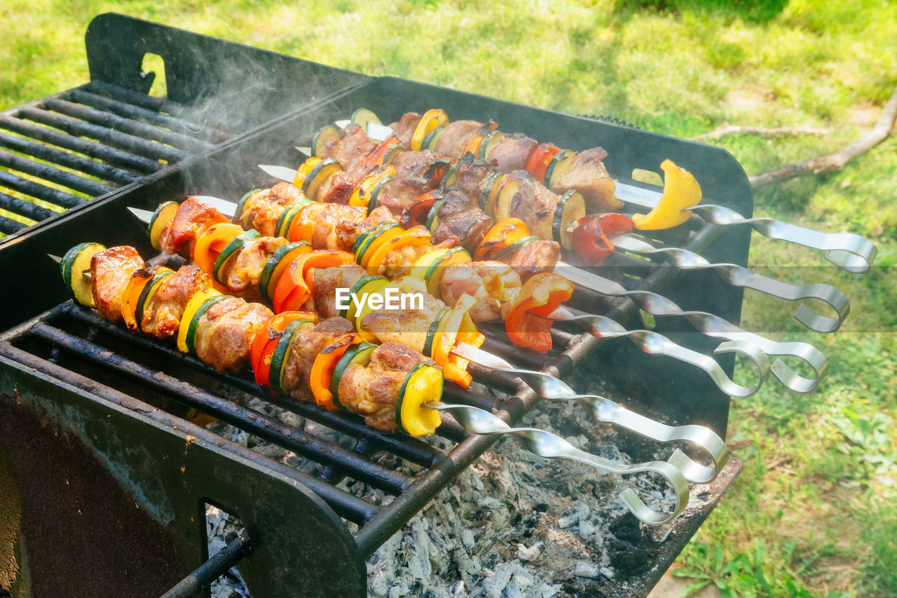 Close-up of meat on barbecue grill