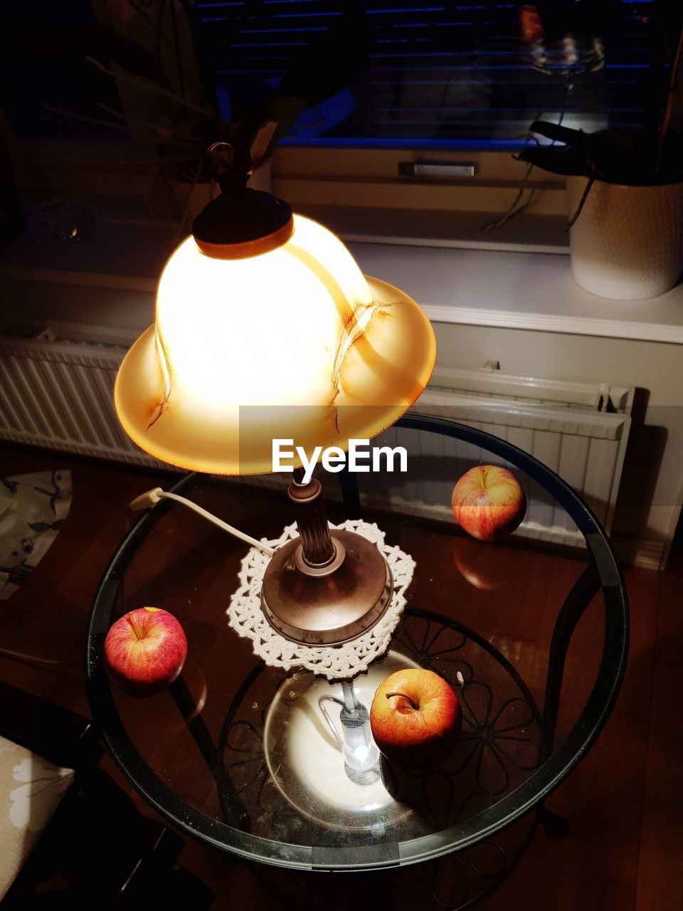 CLOSE-UP OF FRUITS HANGING ON TABLE