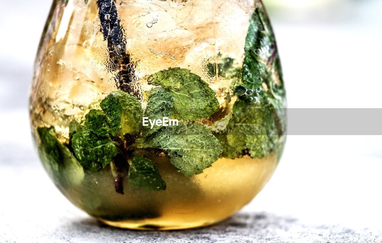CLOSE-UP OF LEMON ON TABLE