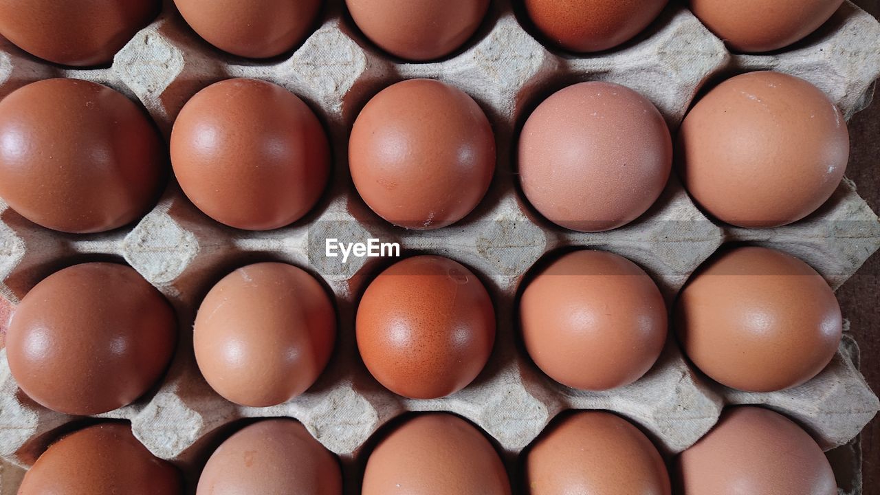 full frame shot of brown eggs