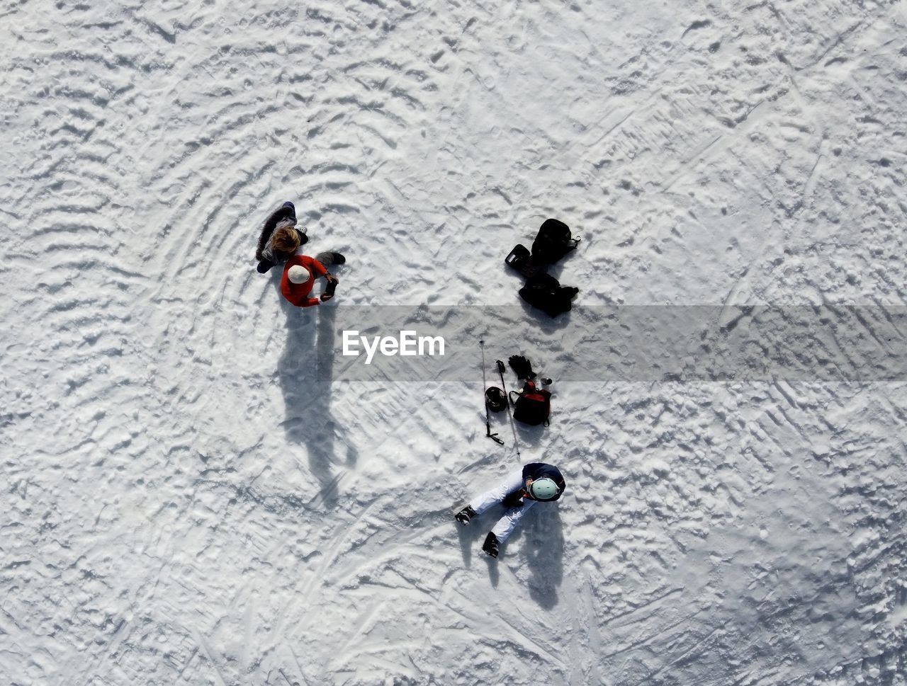 High angle view of people in snow