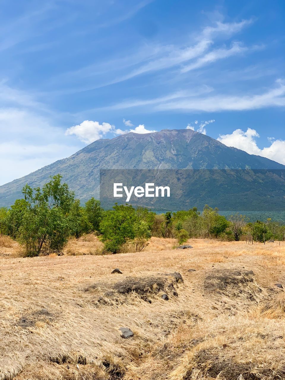 Scenic view of mount agung potrait against sky