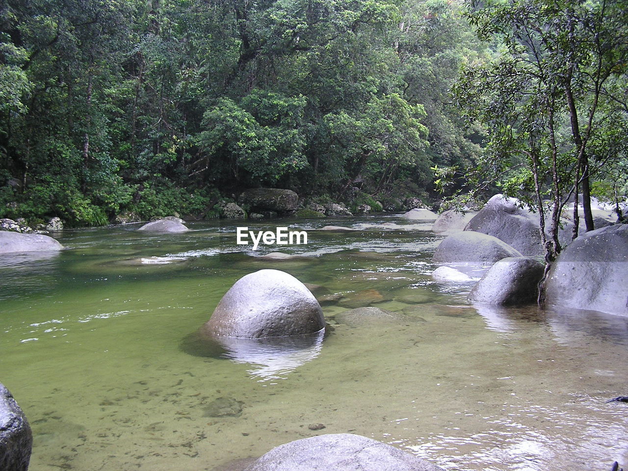 WATER FLOWING THROUGH ROCKS