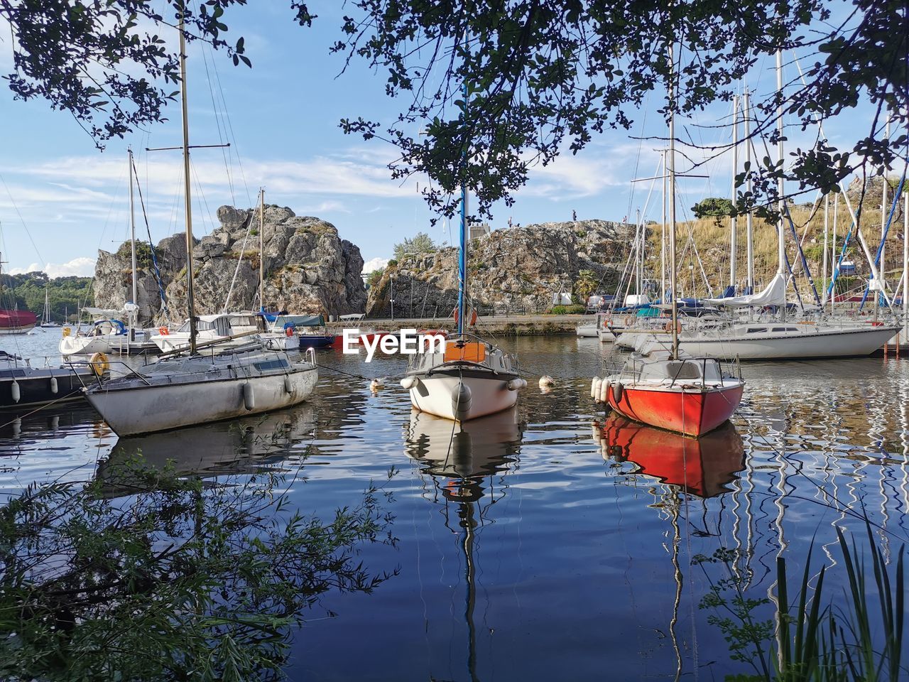 BOATS MOORED IN MARINA