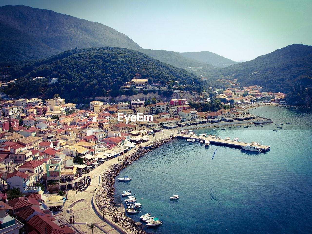 High angle view of townscape by sea