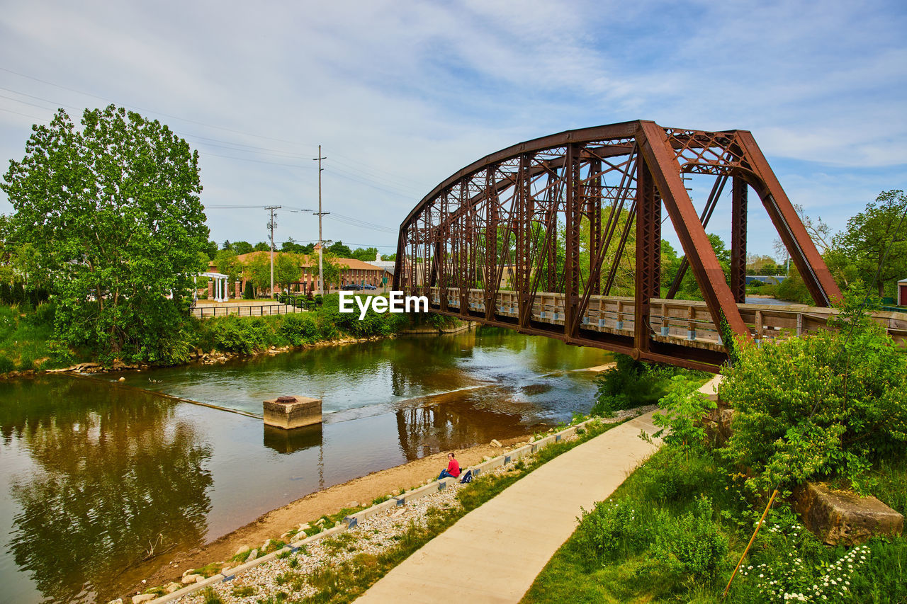 view of bridge over river against sky