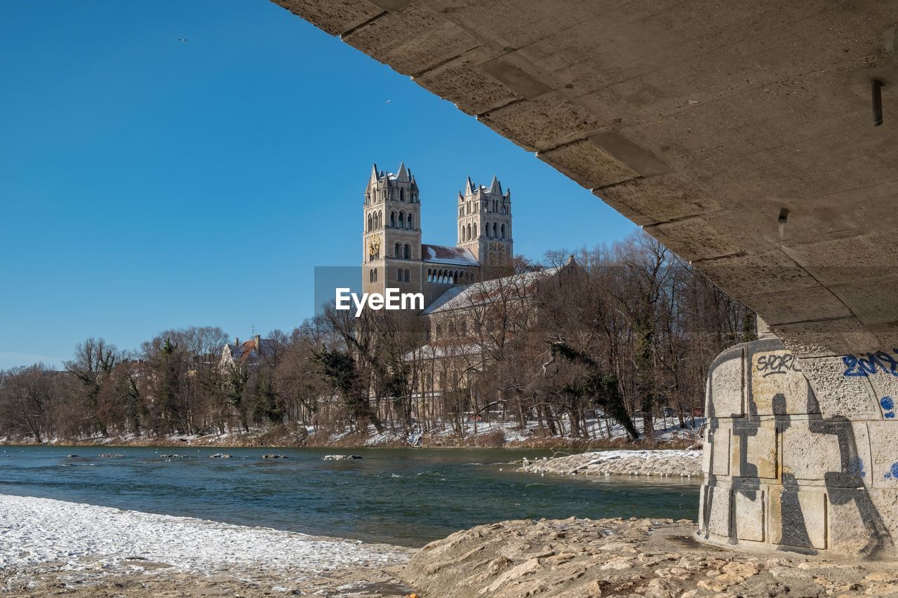 BUILDINGS BY RIVER