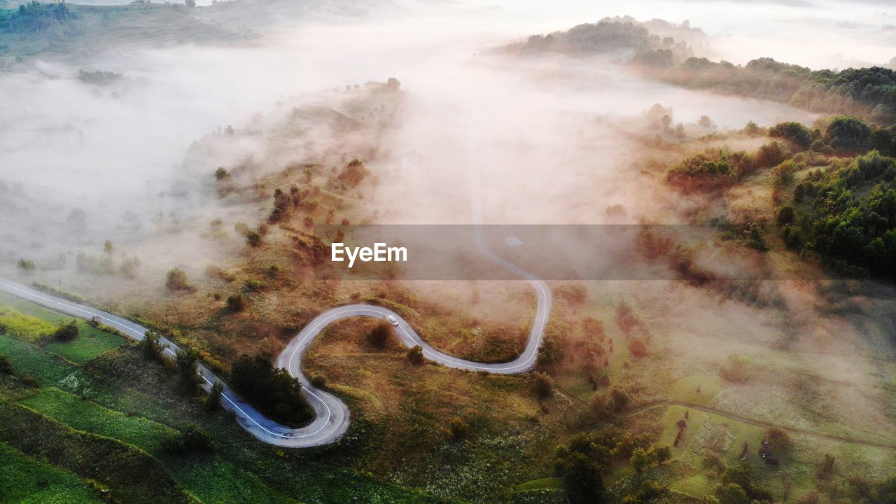 Aerial view of road amidst landscape