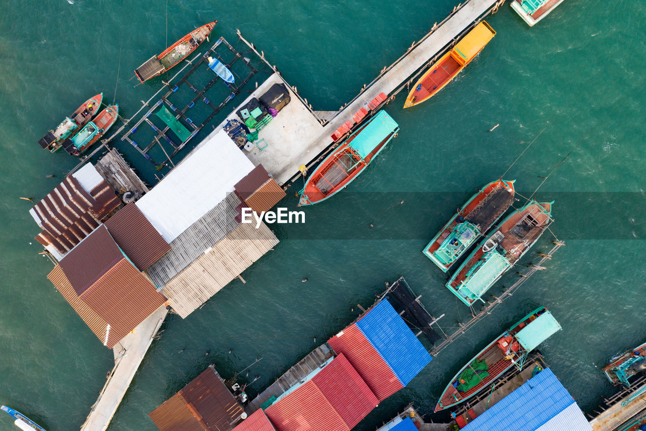 High angle view of commercial dock by sea