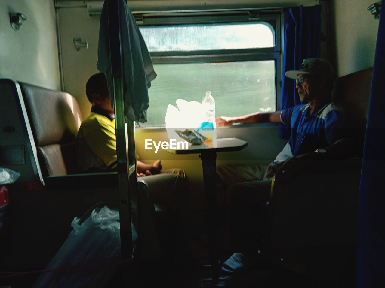 PEOPLE IN TRAIN