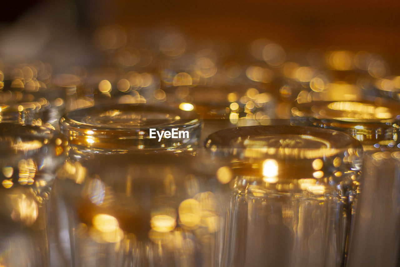 CLOSE-UP OF GLASS JAR ON TABLE AT BAR